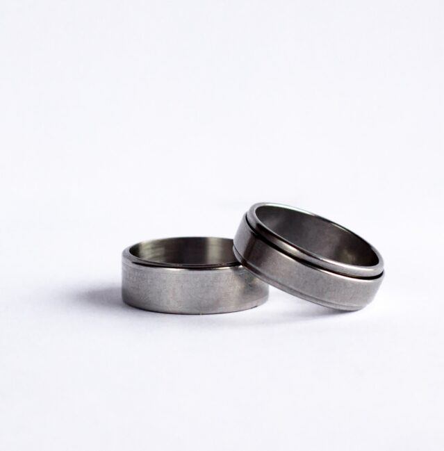 pair of men's silver wedding rings