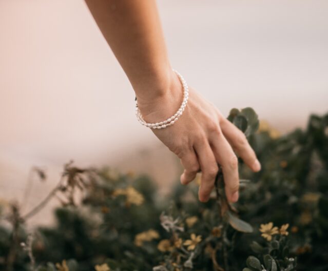 woman wearing silver bracelet