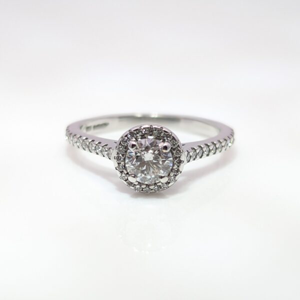 Discover our 0.77ct Platinum Round Brilliant Cut Diamond Halo Engagement Ring. With a Centre Diamond of 0.45ct and outer Diamond Total Weight 0.32ct. Colour G Clarity SI. Find out more about our ethical jewellery campaign.