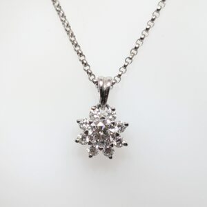 Discover our 0.49ct Diamond Cluster Necklace on an 16" Belcher Chain which is adjustable to an 18" in 18ct White Gold. 