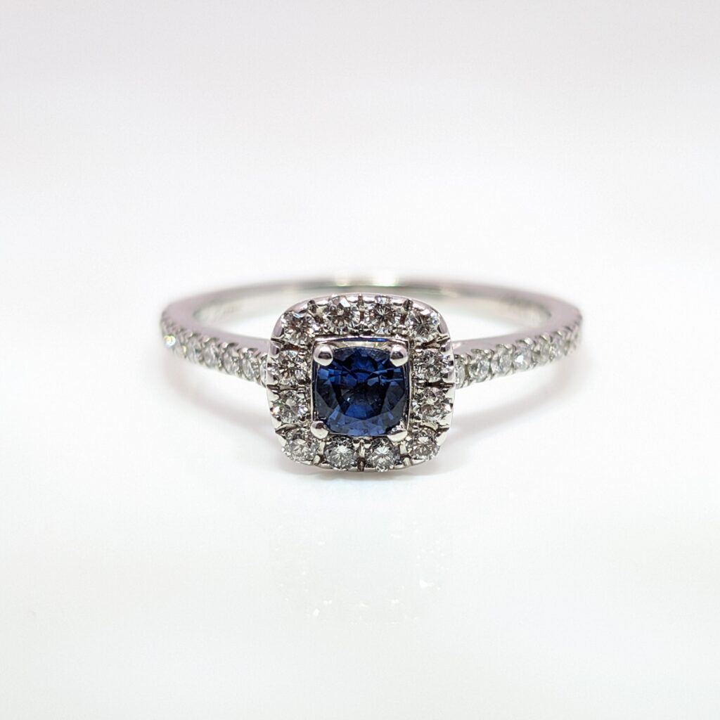 Vintage pre-loved sapphire & diamond halo ring in 14k white gold