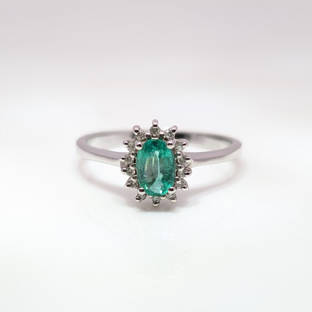 oval emerald & diamond halo ring in 9ct white gold
