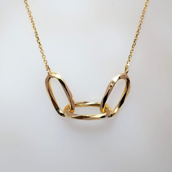 Shop our collection of stunning necklaces. Discover this classic 3 Interlocking Oval Rings Necklace in 9ct Yellow Gold with an adjustable chain. Chain length 18 inches.
