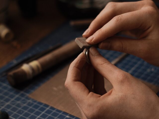 jeweller repairing engagement ring