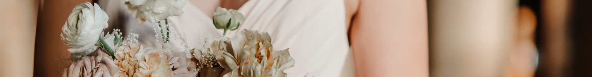 bridesmaid holding flowers