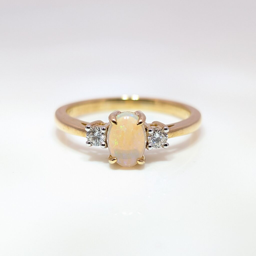 opal & diamond trilogy ring in 9ct yellow gold