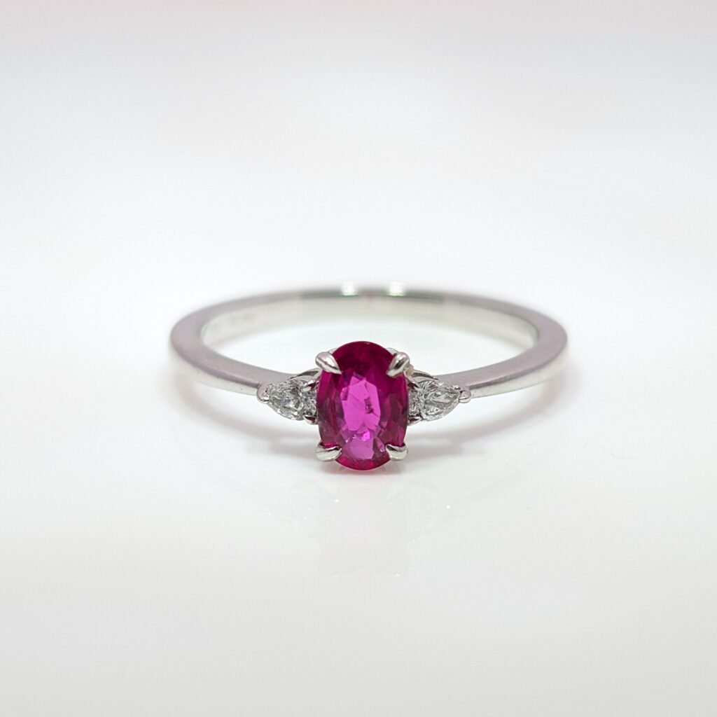 oval ruby & diamond trilogy ring in 18ct white gold