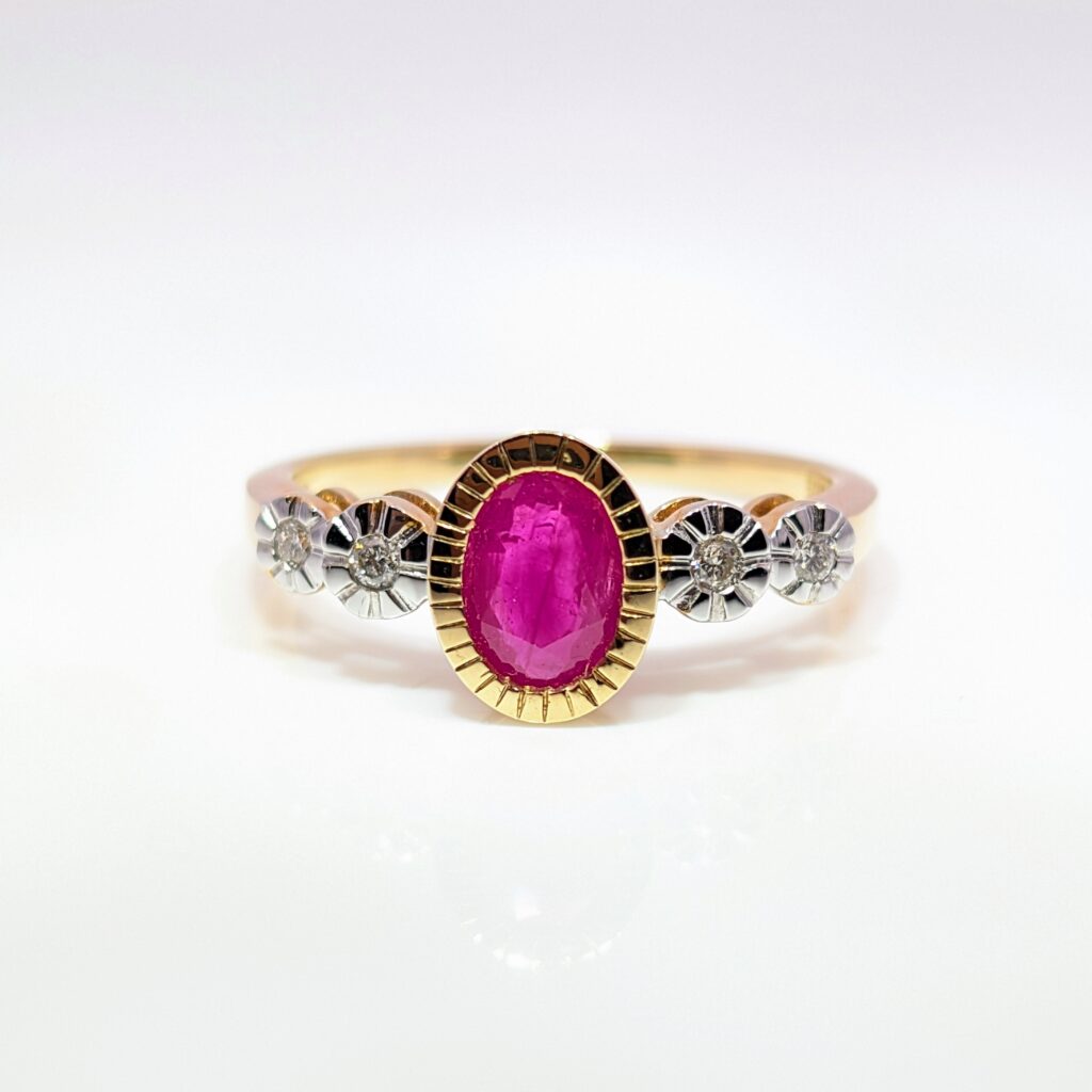 0.87ct Oval Ruby and Illusion Set Diamond Ring 9k Yellow Gold | 37817