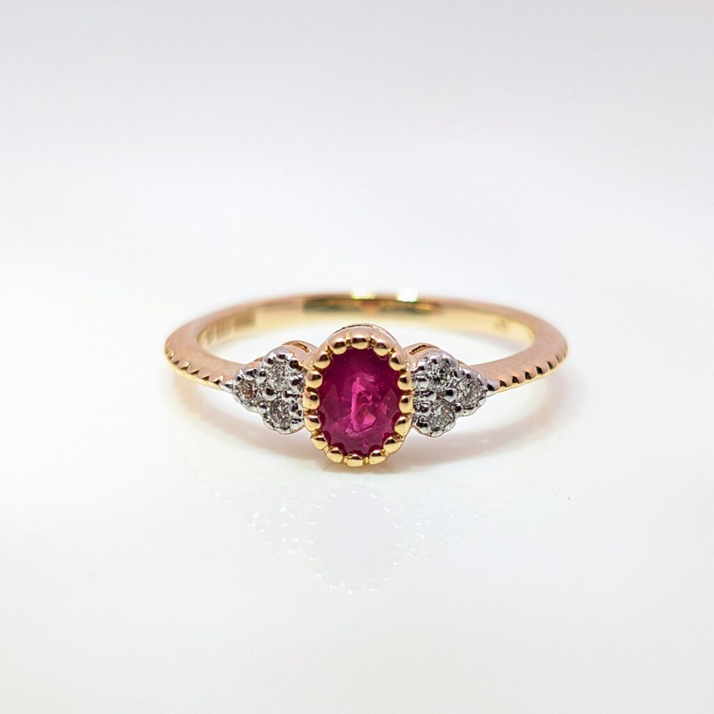 9k Yellow Gold Oval Ruby Ring with Tapered Diamond Shoulders | 41414