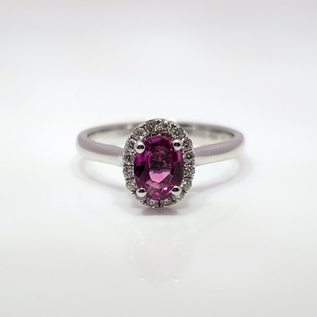 ruby & diamond oval cluster ring in 9ct white gold