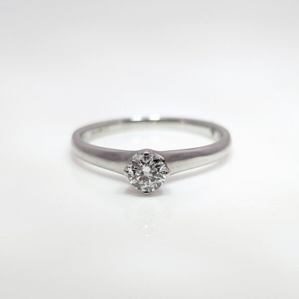 This timeless 0.28ct Solitaire Diamond Engagement Ring is set in a sleek 18ct White Gold band.