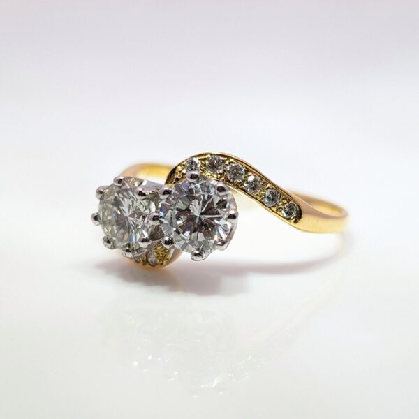 Two Stone Brilliant Cut 1.27ct Diamonds in an 18ct Yellow Gold Band
