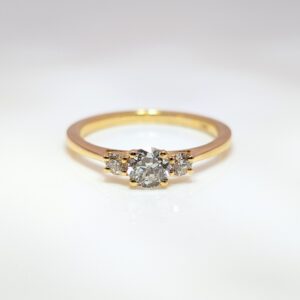 Discover our Trilogy 0.47cts Engagement Ring in 18ct Yellow Gold. Celebrating the ‘past, present, and future’ symbolism, this piece makes an exceptional engagement ring or something to celebrate a special occasion. 