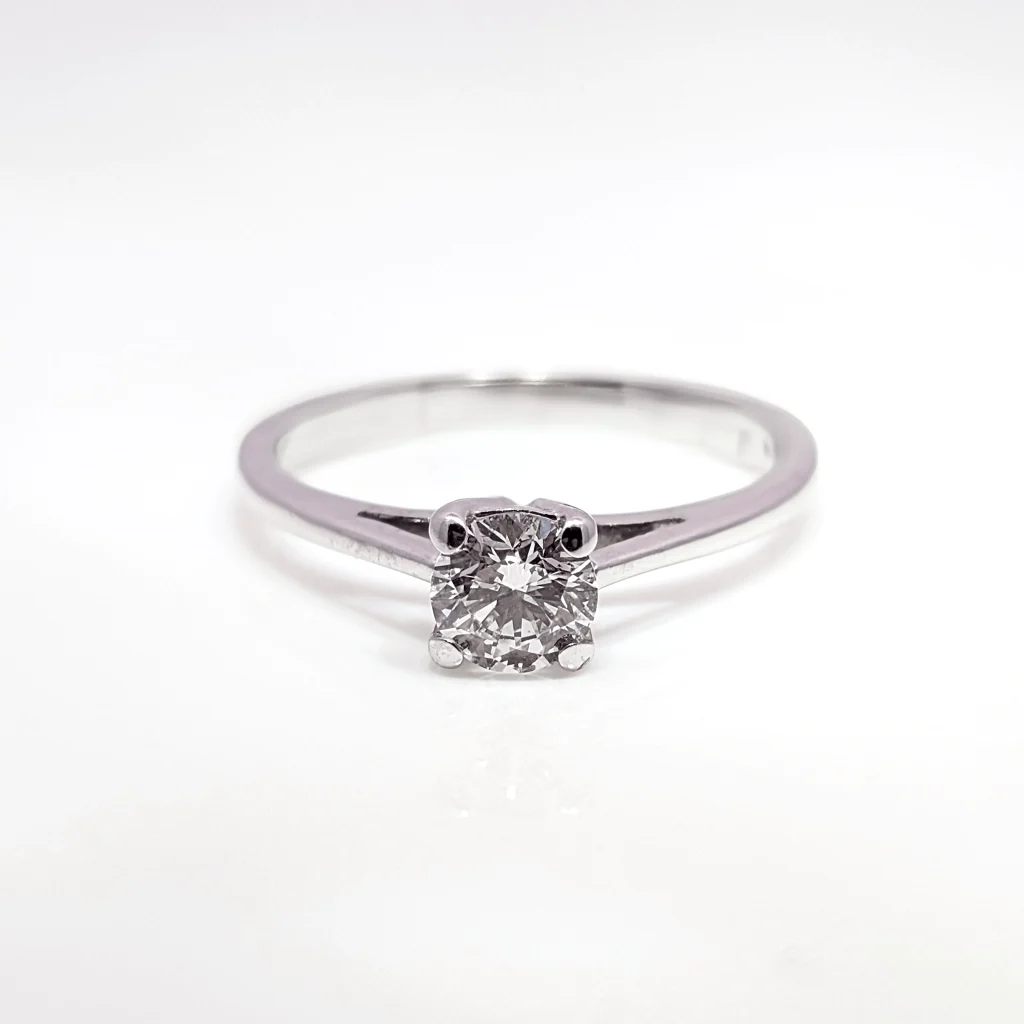 Vintage pre-loved diamond solitaire engagement ring in 18k white gold