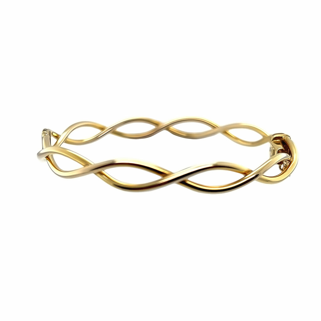 Solid gold crossover bangle on white background