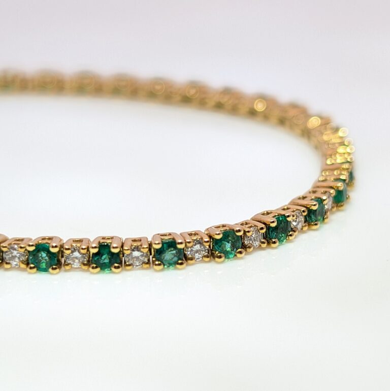Discover our Emerald and Diamond Tennis Bracelet in 18ct Yellow Gold. This classic piece has 1.94ct of Emeralds and 0.83ct of Diamonds. Emerald jewellery is a timeless gift, but is especially meaningful to those with a May birthday.