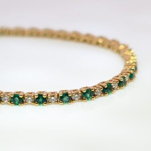 Discover our Emerald and Diamond Tennis Bracelet in 18ct Yellow Gold. This classic piece has 1.94ct of Emeralds and 0.83ct of Diamonds. Emerald jewellery is a timeless gift, but is especially meaningful to those with a May birthday.