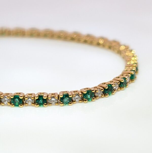 Discover our Emerald and Diamond Tennis Bracelet in 18ct Yellow Gold. This classic piece has 1.94ct of Emeralds and 0.83ct of Diamonds. Emerald jewellery is a timeless gift, but is especially meaningful to those with a May birthday.