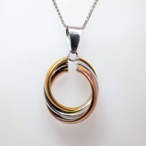 Transform your favourite chain with a timeless pendant from Aleks Jewellers. Discover our Three Colour Oval Russian Wedding Look Pendant in 9ct White Gold. 