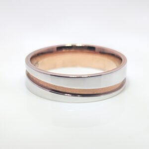 Discover our 6mm Mens Wedding Band in 9ct Rose Gold and White Gold. A slightly wider band offering more presence on the finger without feeling too bulky. Perfect for those who want a bolder, yet comfortable option.