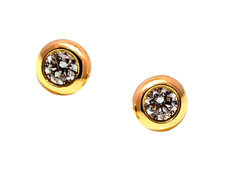 golden studs with diamond centre
