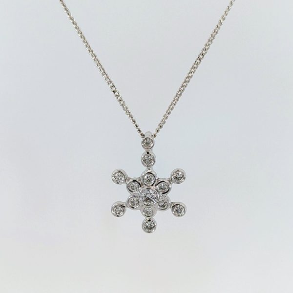Transform your favourite chain with a timeless pendant from Aleks Jewellers. Discover our Diamond Snowflake Pendant in 18k White Gold. (Chain sold separately)