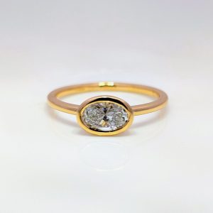 0.74ct Lab-Grown Oval Diamond Bezel Ring 9k Yellow Gold | 43425