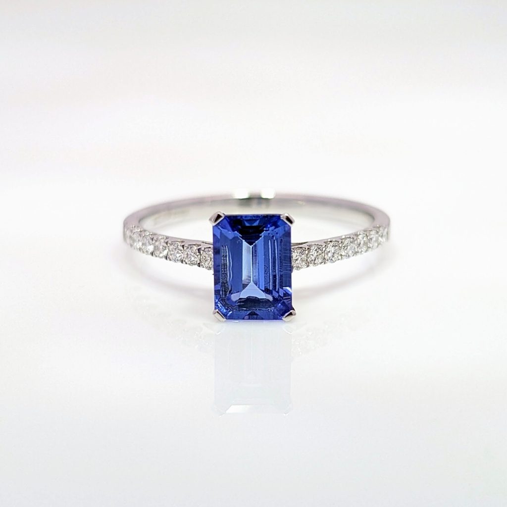 tanzanite ring with diamond set shoulders in 18ct white gold