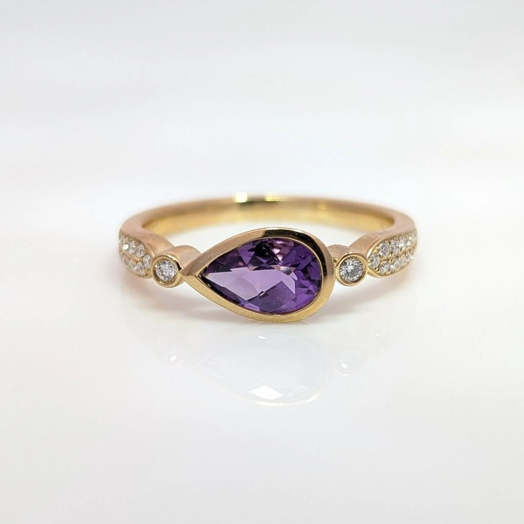 pear shaped amethyst & diamond ring in 9ct yellow gold