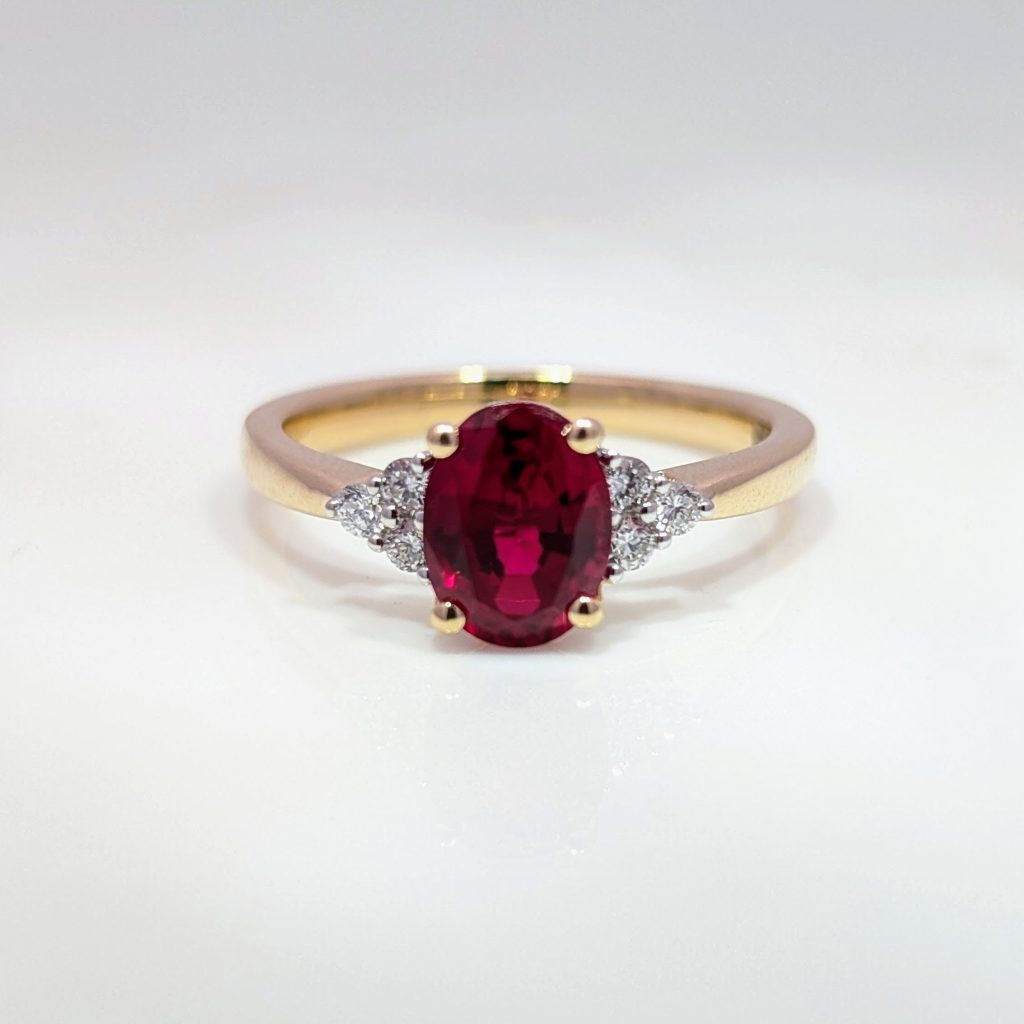 lab grown oval ruby & diamond engagement ring in 9k yellow gold