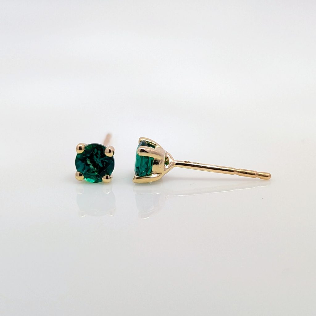 Round lab grown emerald stud earrings in 9k yellow gold