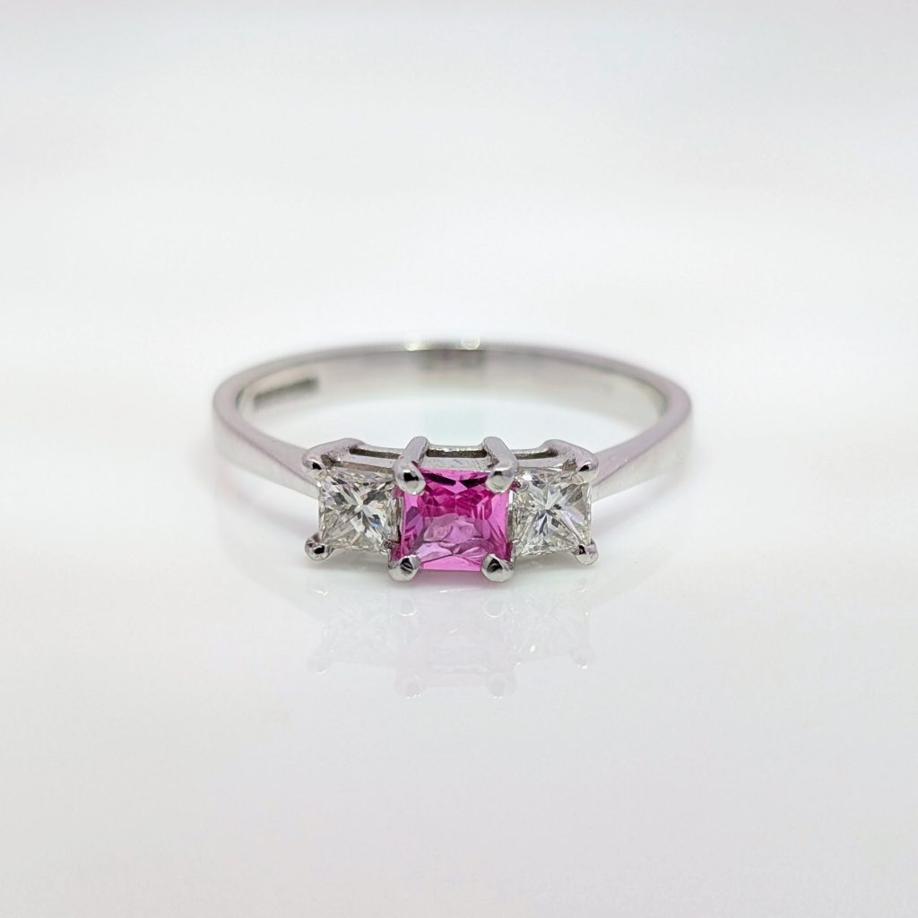 princess cut pink sapphire & diamond trilogy ring in 18ct white gold
