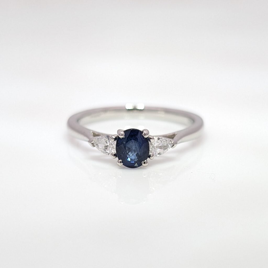oval sapphire & diamond trilogy engagement ring in platinum
