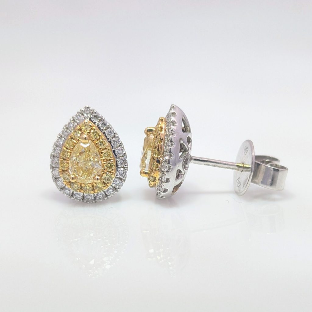 Vintage pre-loved yellow diamond pear stud earrings in 18k white gold