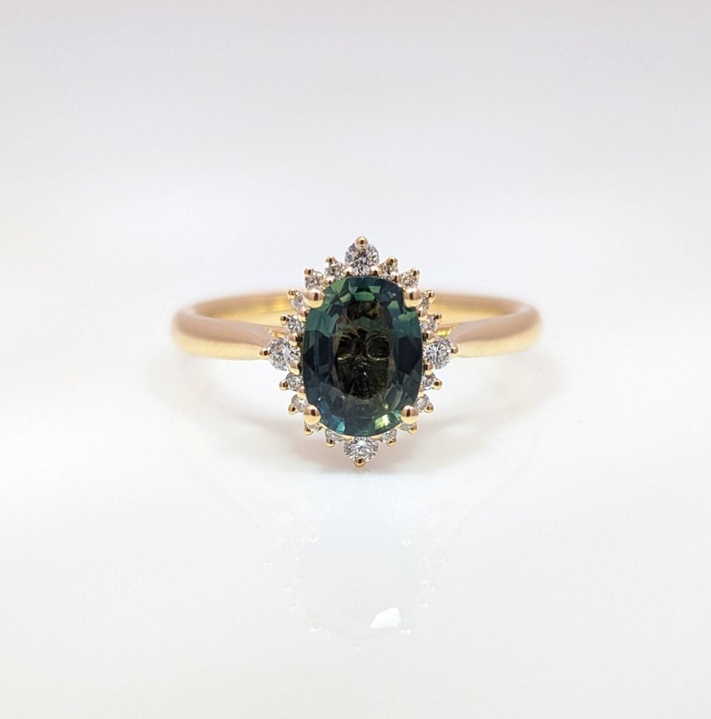 green sapphire & diamond cluster engagement ring in 18k yellow gold