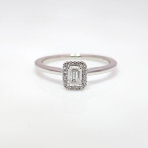 emerald cut diamond cluster engagement ring in platinum