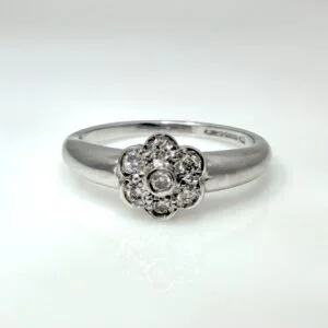 pre-loved diamond flower ring in 9ct white gold